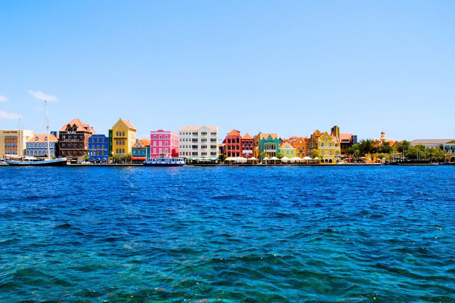 Woman with Rental Car at the Beach